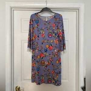 Women’s beautiful dress with blue stripes and flowers